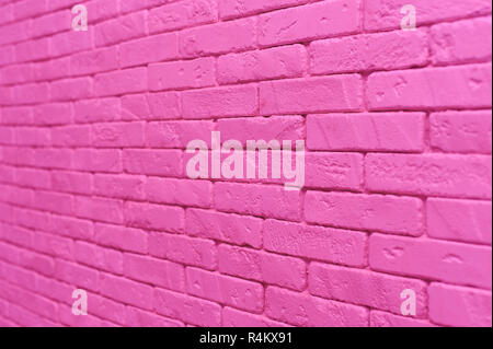 pink brick wall painted at pastel tender colour. closeup texture background Stock Photo