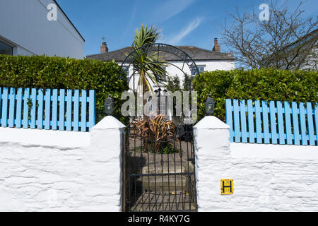 Any Way The Wind Blows written in iron over the gate of a house in Portscatho on the south coast of Cornwall, England, UK Stock Photo