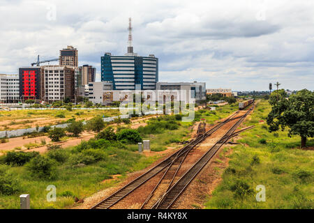 Railroad and rapidly developing central business district, Gaborone, Botswana, Africa, 2017 Stock Photo