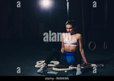 sport woman smile at camera self picture at gym, young girl picture herself exercising fitness center. Stock Photo