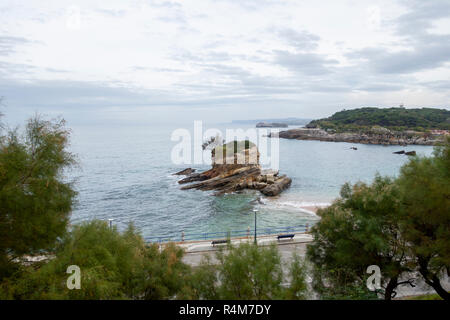 Rock in the beach of El Camello in Santander, Spain Stock Photo