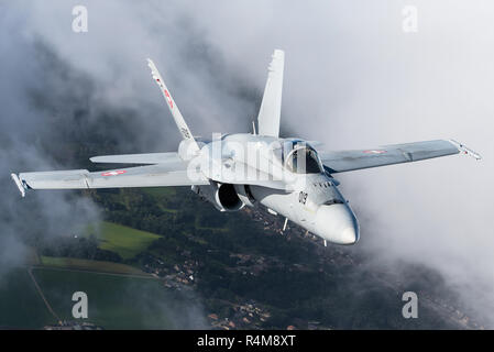 Flying with the McDonnell Douglas F/A-18C Hornet of the Swiss Air Force. Stock Photo