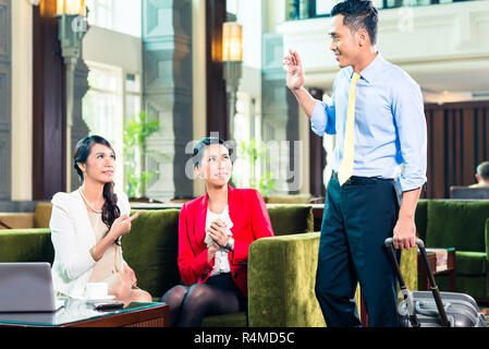 Asian businesspeople having meeting Stock Photo