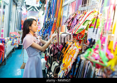 Woman picking something in shop Stock Photo