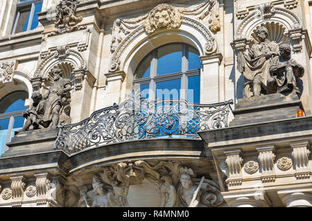 Old beautiful building exterior with balcony and statues in Mitte district, Berlin, Germany. Stock Photo