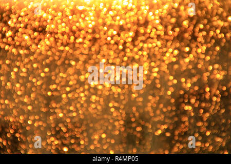 Golden bokeh. Texture with gold abstraction. Creative abstract golden patterned background. A lot of gold bokeh Stock Photo