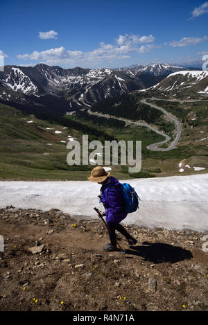 Woman hiking in mountains of Loveland Pass, Colorado Stock Photo