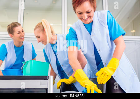 Cleaning ladies working in office Stock Photo