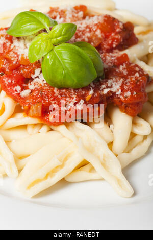 capunti alla puttanesca an italian noodle dish Stock Photo