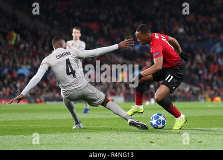 BSC Young Boys' Mohamed Ali Camara (left) and Manchester United's Anthony Martial battle for the ball during the UEFA Champions League, Group H match at Old Trafford, Manchester. PRESS ASSOCIATION Photo. Picture date: Tuesday November 27, 2018. See PA story SOCCER Man Utd. Photo credit should read: Martin Rickett/PA Wire.