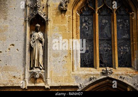 A limestone statuette set in the walls of St Mary's chapel, Sudeley Castle, Gloucestershire Stock Photo