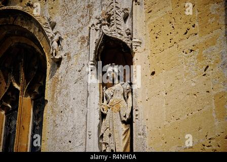 A limestone statuette set in the walls of St Mary's chapel, Sudeley Castle, Gloucestershire Stock Photo