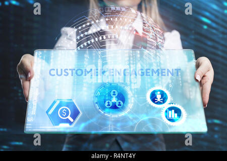 The concept of business, technology, the Internet and the network. A young entrepreneur working on a virtual screen of the future and sees the inscrip Stock Photo