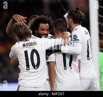 Rome, Italy. 27th Nov, 2018. Real Madrid's players celebrate scoring during a group G match of UEFA Champions League between Roma and Real Madrid, in Rome, Italy, Nov. 27, 2018. Real Madrid won 2-0. Credit: Alberto Lingria/Xinhua/Alamy Live News Stock Photo
