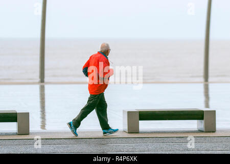 Blackpool, Lancashire, UK  Weather. 28th November, 2018. Cold Blustery day on the north-west coast with gale force winds.  A spell of heavy rain and strong winds is with weather warnings issued with some short-term loss of services as winds strengthen. Credit; MediaWorldImages/AlamyLiveNews. Stock Photo