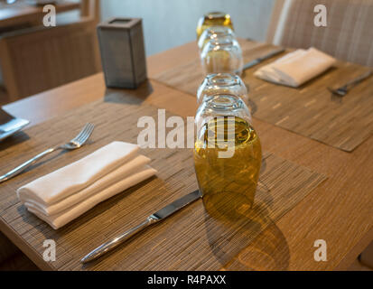 Table for two in shipboard restaurant by window Stock Photo