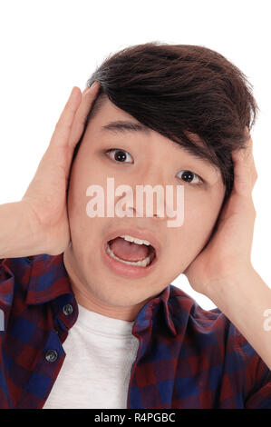 Screaming Asian teenager. Stock Photo