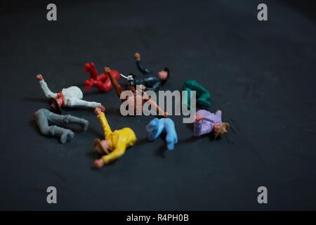 Still life with TImpo cowboys and Indians figures. Stock Photo