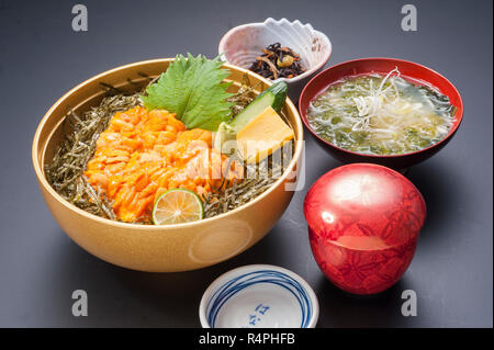 Bowl of fresh urchin eggs and seaweed soup Stock Photo