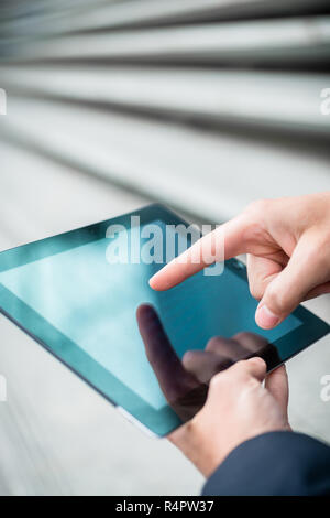 Tablet pc device with connection lines on screen in hands of doctor ...