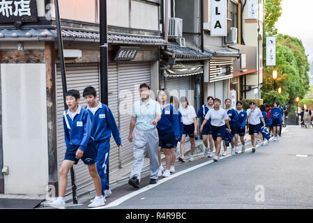 Schoolchildren going to a sport class, Kyoto, Japan Stock Photo