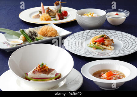 Japanese platters of fresh seafood, cod, soup and sushi Stock Photo
