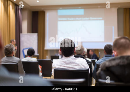 Male speeker having talk at public event. Stock Photo