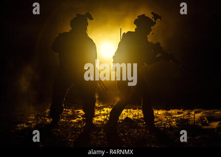 Black silhouettes of soldiers Stock Photo