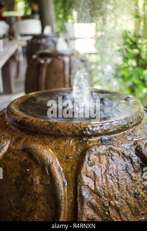 Home Garden Decorated With Vintage Fountain Stock Photo