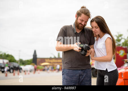 Young tourist couple having vacation together in Ayutthaya, Thai Stock Photo