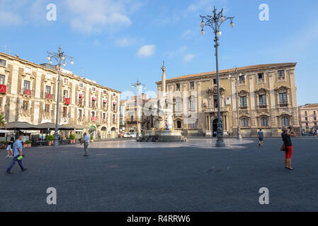 Catania, Sicily, Italy - August 23, 2017: Tourists visit Piazza del Duomo with Fontana dell'Elefante in Catania Stock Photo