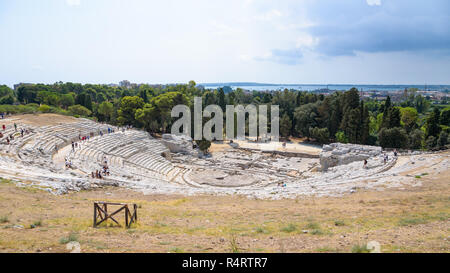 Syracuse, Sicily, Italy - August 23, 2017: Tourists visit ancient greek theatre of Syracuse Stock Photo