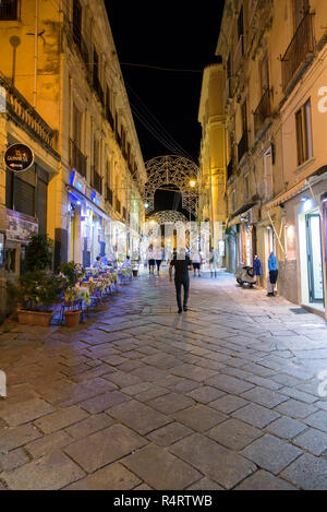 Tropea, Italy - September 06, 2016: Tourists visit famous small town in southern Italy by night Stock Photo