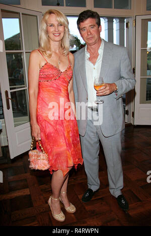 NEW YORK - AUGUST 14: Sara Herbert-Galloway and Jay McInerney attend the Best Buddies Hamptons Beach Bash at a private residence on August 14, 2008 in Water Mill, New York. (Photo by Steve Mack/S.D. Mack Pictures) Stock Photo