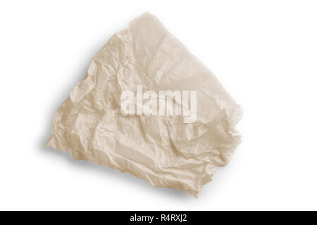 Crumpled parchment for baking isolated on white Stock Photo