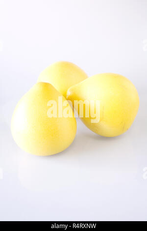 Citrus maxima. Pomelo fruit on a white background. Stock Photo