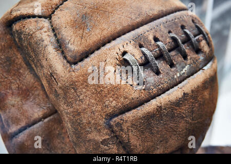 Old leather soccer ball with lacing Stock Photo