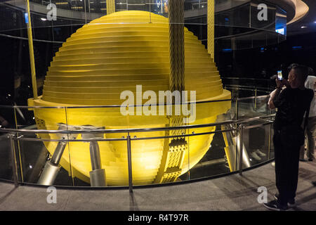 Huge,Damper,dampers,weight,counterweight,balance,at,top,of,observatory,tower,at,Taipei 101 Tower,Taipei,Chinese,China,Republic of China,ROC,Asia,Asian Stock Photo