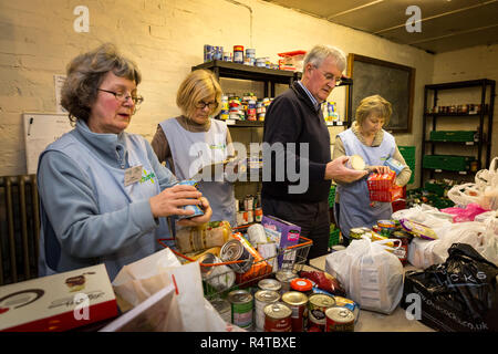 Volunteers sort out newly arrived donations at Arnold Foodbank Daybrook Baptist Church's food store and provide those in need with donated food in Nottingham. Stock Photo