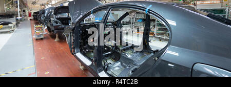 frame of car body. Long format. Wide angle view of plant of automotive industry. Can be used as banner Stock Photo