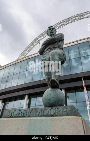 London, UK - April 27, 2018: Statue of Bobby Moore at the main entrance of the Wembley Stadium Stock Photo