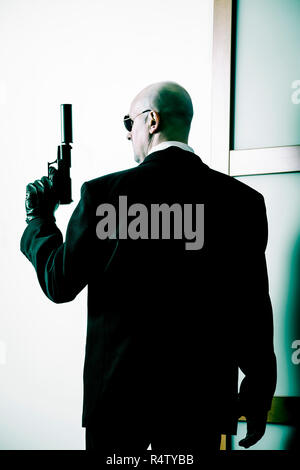 Armed secret agent Stock Photo