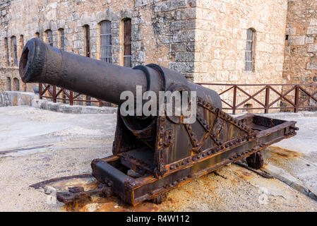 Old cannon or artillery gun at Morro Castle, a fortress, lighthouse and iconic landmark of Cuba guarding entrance to Havana Bay. Stock Photo