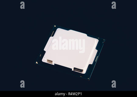 Electronic collection - CPU from the bottom side isolated on black background. Stock Photo