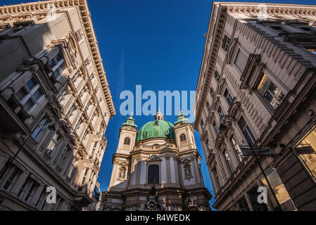 Vienna, Austria - December 24, 2017. St. Peter's Church or Peterskirche is famous Baroque church and popular viennese landmark. Roman Catholic parish  Stock Photo