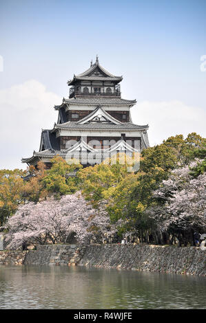 Hiroshima castle on the side of Otagawa river in spring, Hiroshima Prefecture, Japan Stock Photo