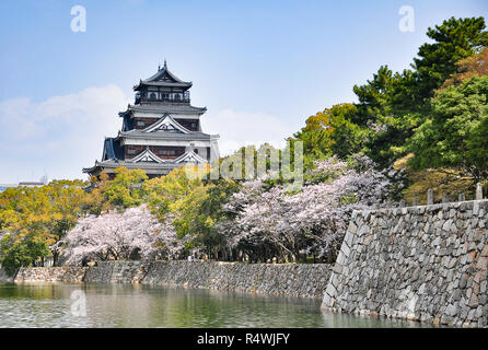 Hiroshima castle on the side of Otagawa river in spring, Hiroshima Prefecture, Japan Stock Photo