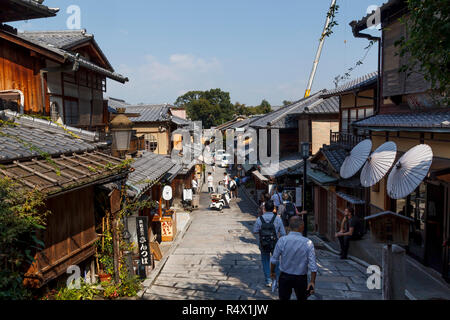 Lots of tourists walking at the streets around Kiyomizu dera temple, in the city of Kyoto, Japan Stock Photo