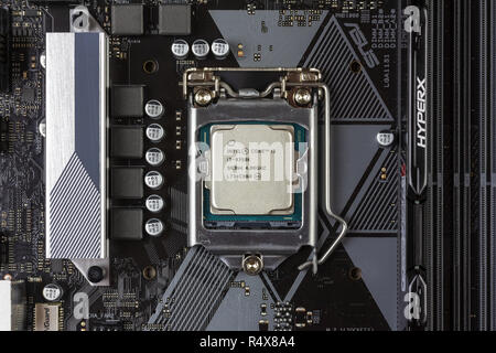 Maykop, Russia - November 9, 2018: intel core I3 desktop processor 8th gen and black DDR 4 DIMM 16 Gb Kingston HyperX Fury Memory RAM Module in the sl Stock Photo