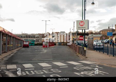 Unidentified people and the vehicular entrance to Dewsbury Bus Station Stock Photo